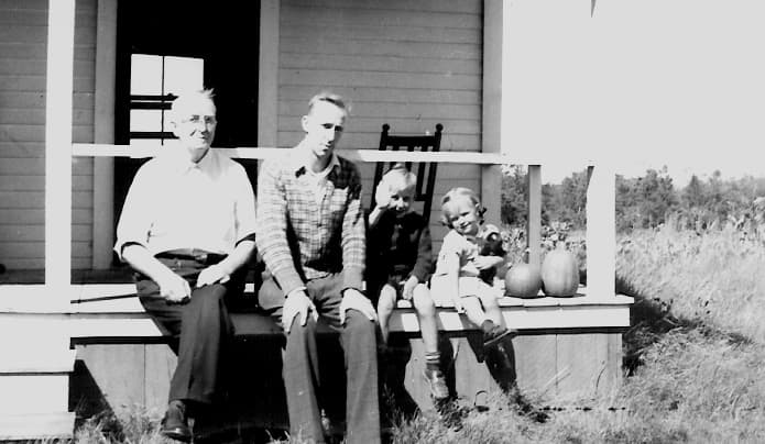 Family gathering on the porch - black and white